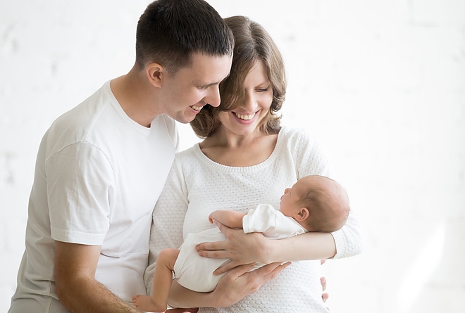 new-parents-holding-newborn-baby-mom-dad-father-mother.jpg